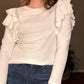 The White Ruffle Top